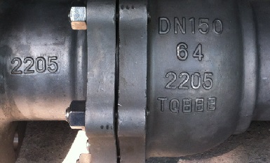 A valve body made of duplex 2205 stainless steel.