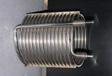 Helical bent-coils made of ASTM B163 seamless tubes.